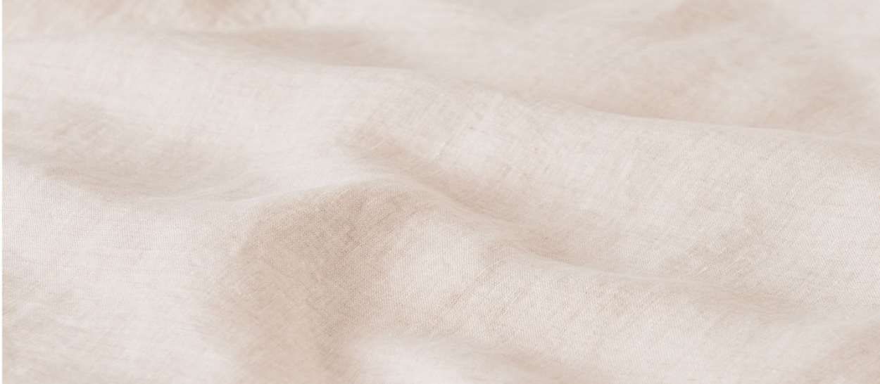 Draps en lin naturel de couleur claire, matière respirante favorisant un sommeil de qualité